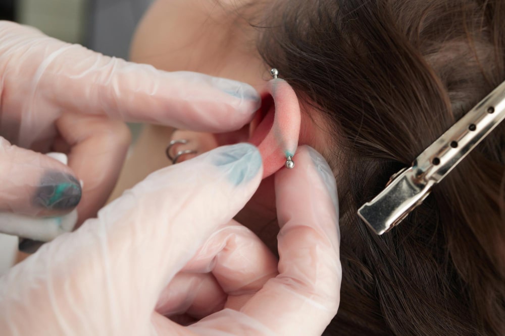 como desinfectar un piercing
